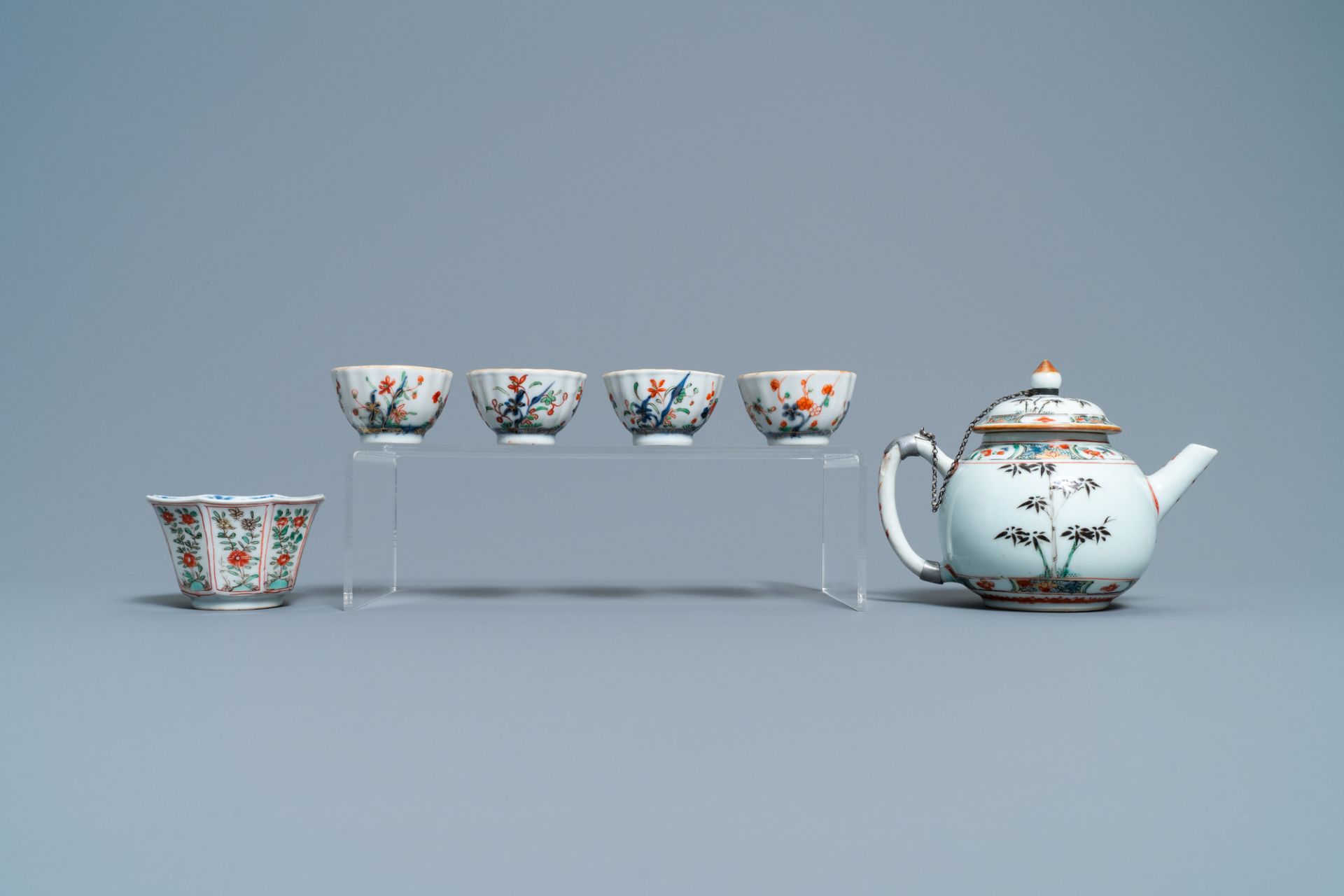 A Chinese famille verte teapot, seven saucers and five cups, Kangxi - Image 6 of 9