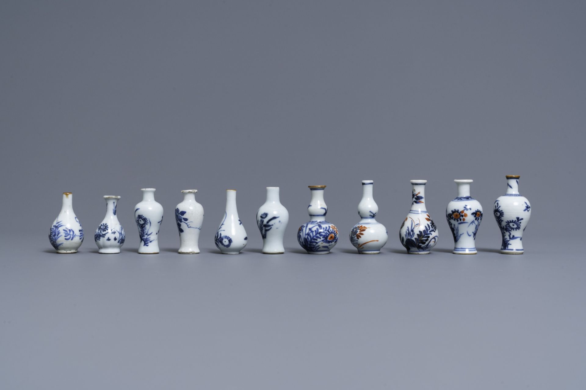 Six Chinese blue and white cups and saucers and eleven miniature vases, Kangxi - Image 5 of 17