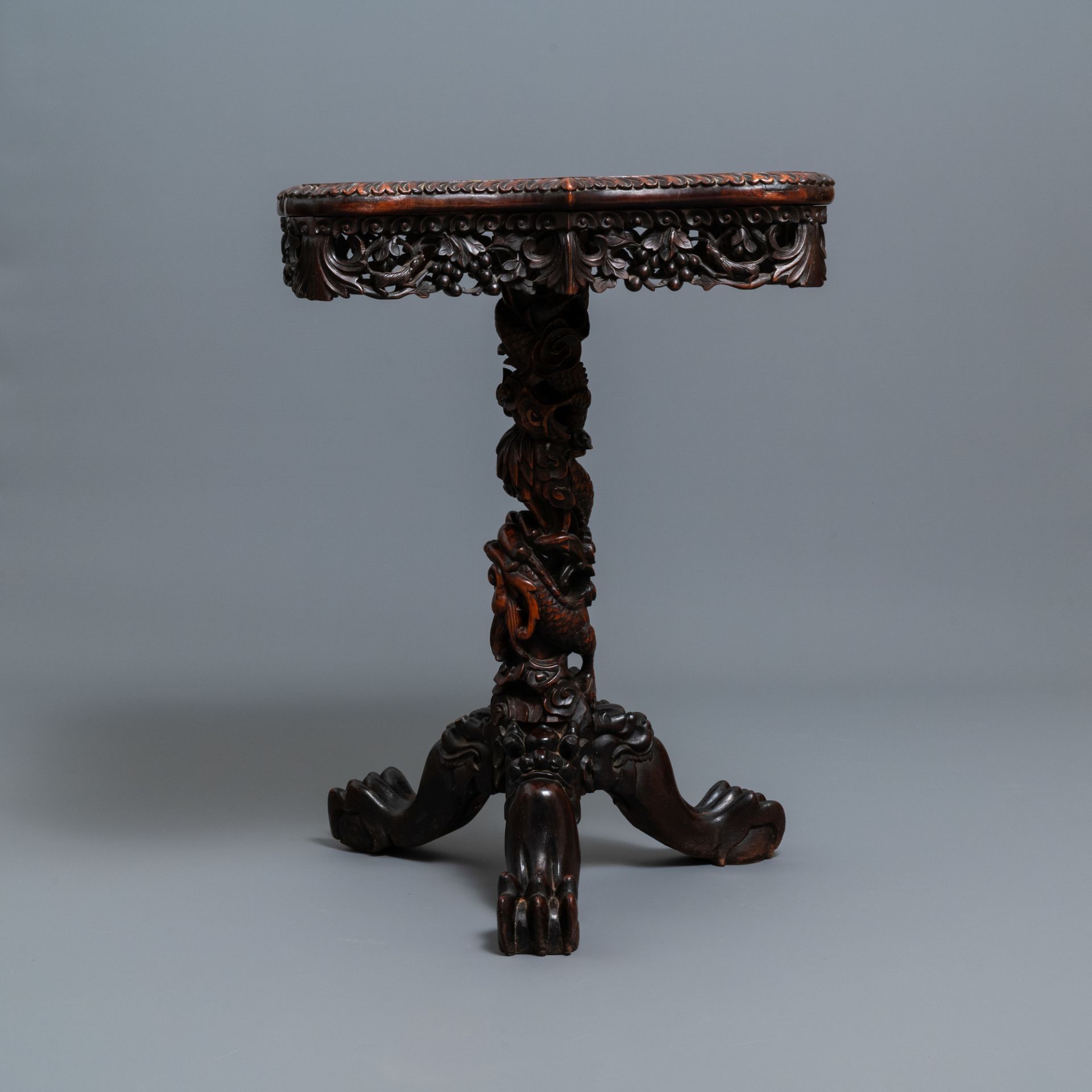 A Chinese carved wooden side table with marble chessboard top, 19th C. - Image 3 of 17