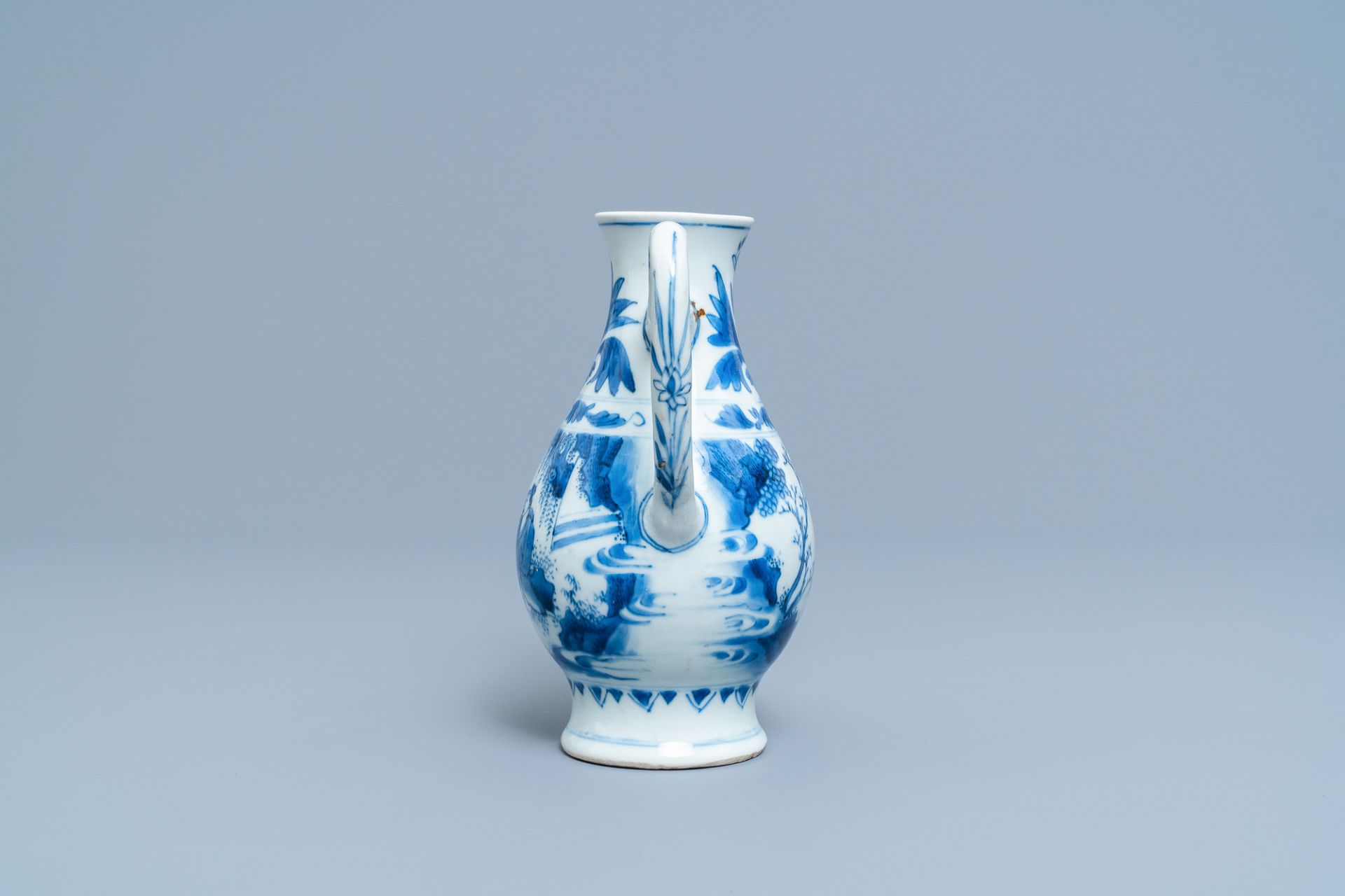 A Chinese blue and white ewer with figures in a landscape, Transitional period - Image 5 of 10