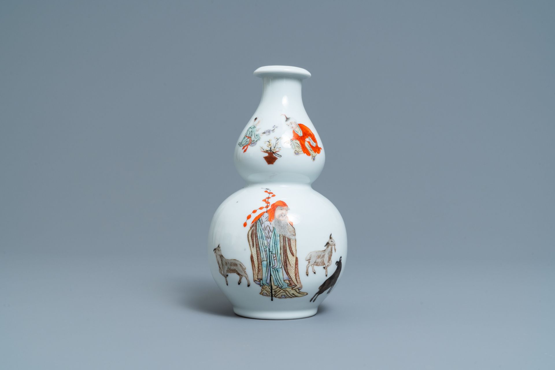 A Chinese polychrome double gourd vase with a goat shepherd, Qianlong mark, Republic