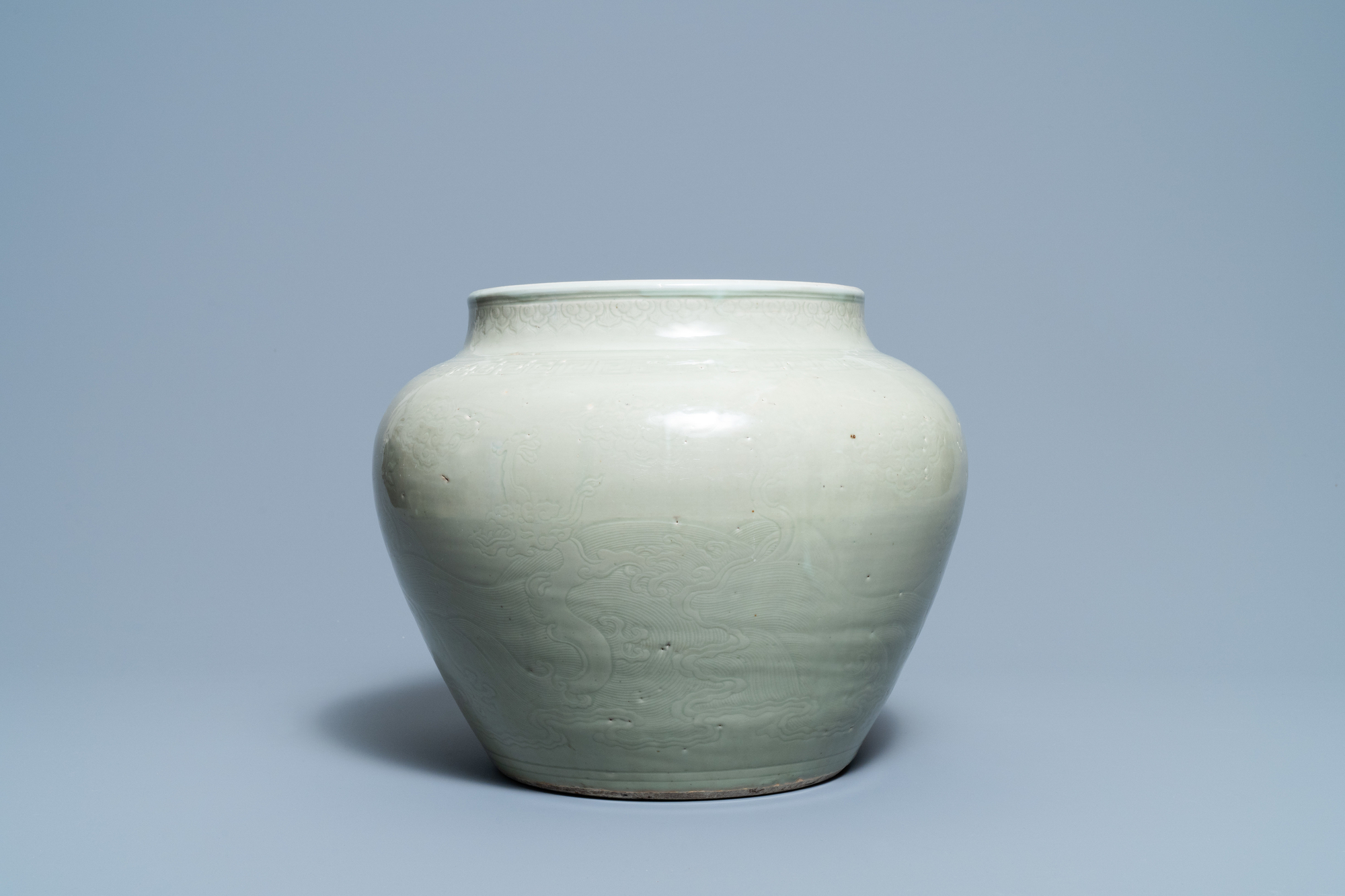 A globular Chinese monochrome celadon 'dragon' vase, Kangxi - Image 4 of 8