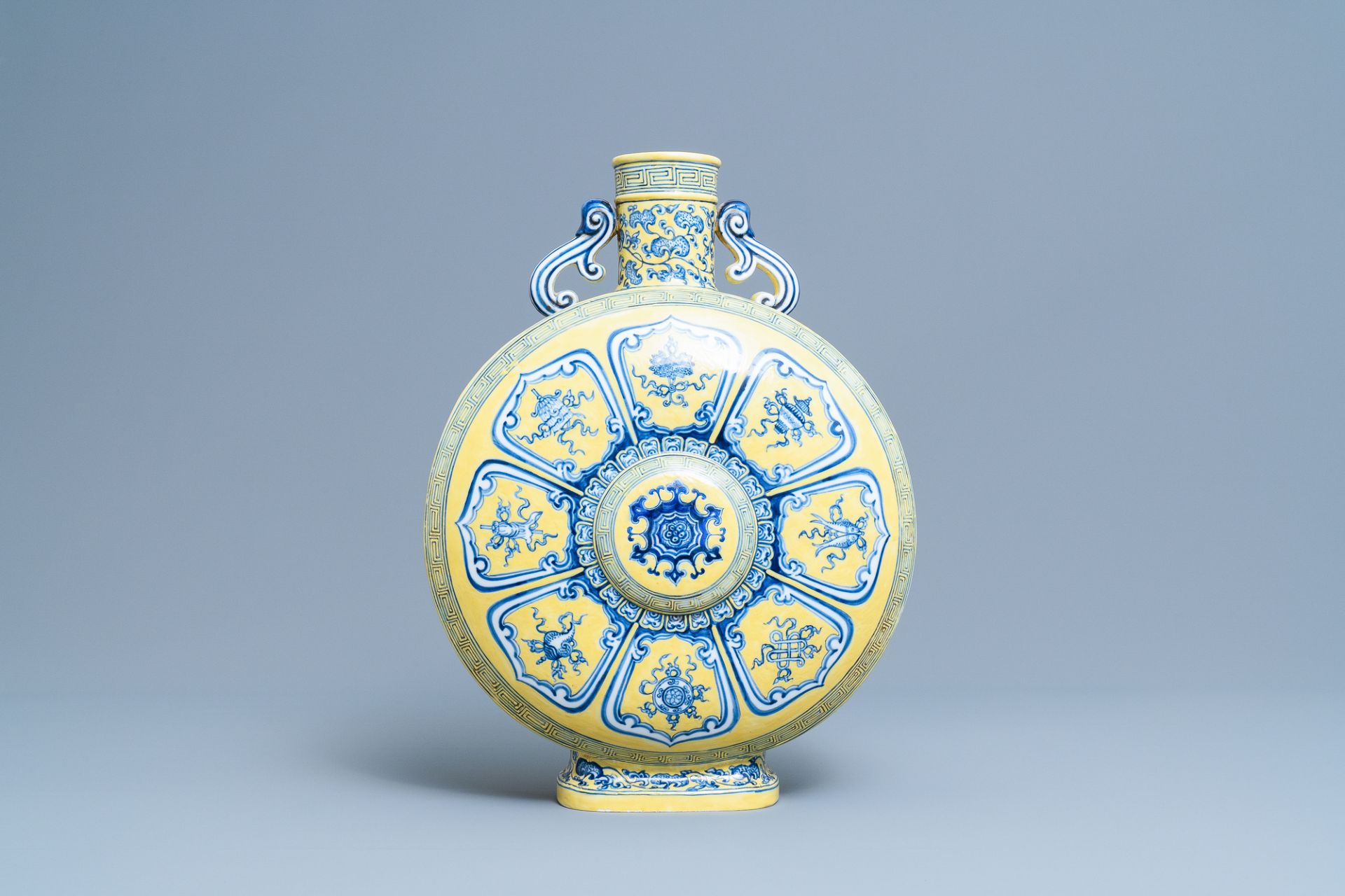 A Chinese yellow-ground blue and white 'Bajixiang' moonflask vase, Yongzheng mark, 19/20th C. - Image 3 of 20