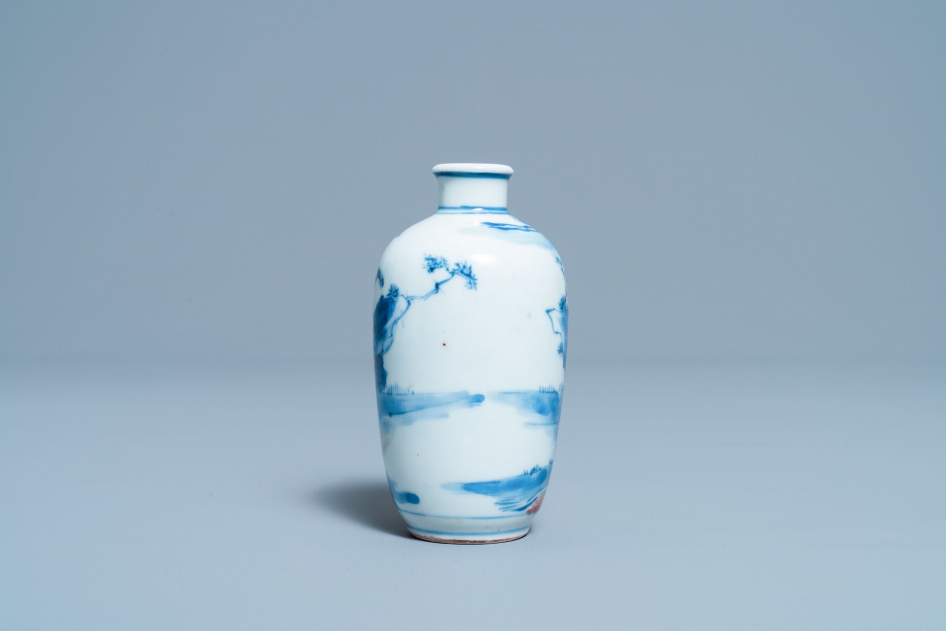 A small Chinese blue, white and copper-red vase, 19th C. - Image 3 of 6