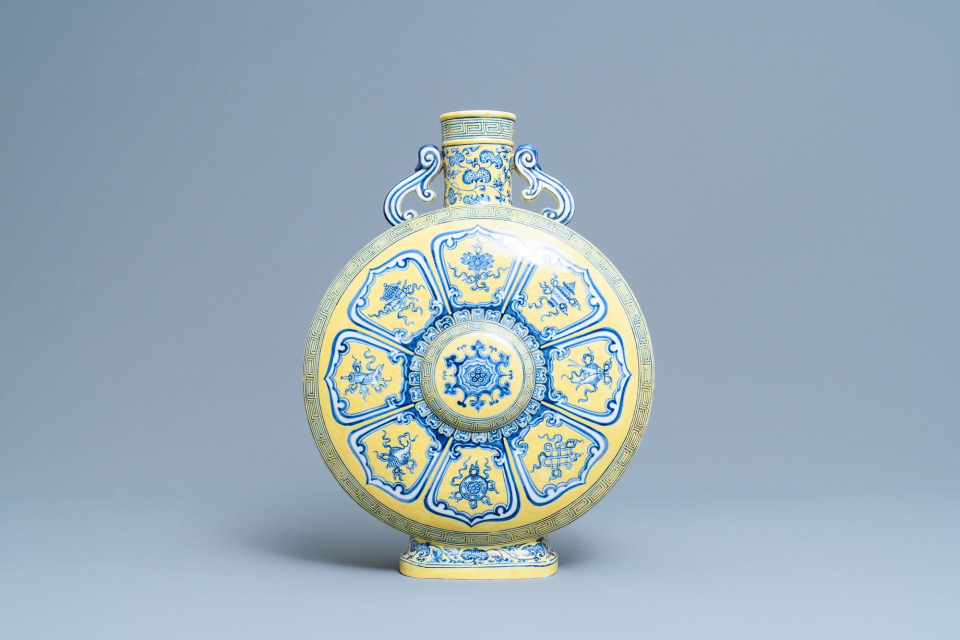 A Chinese yellow-ground blue and white 'Bajixiang' moonflask vase, Yongzheng mark, 19/20th C.