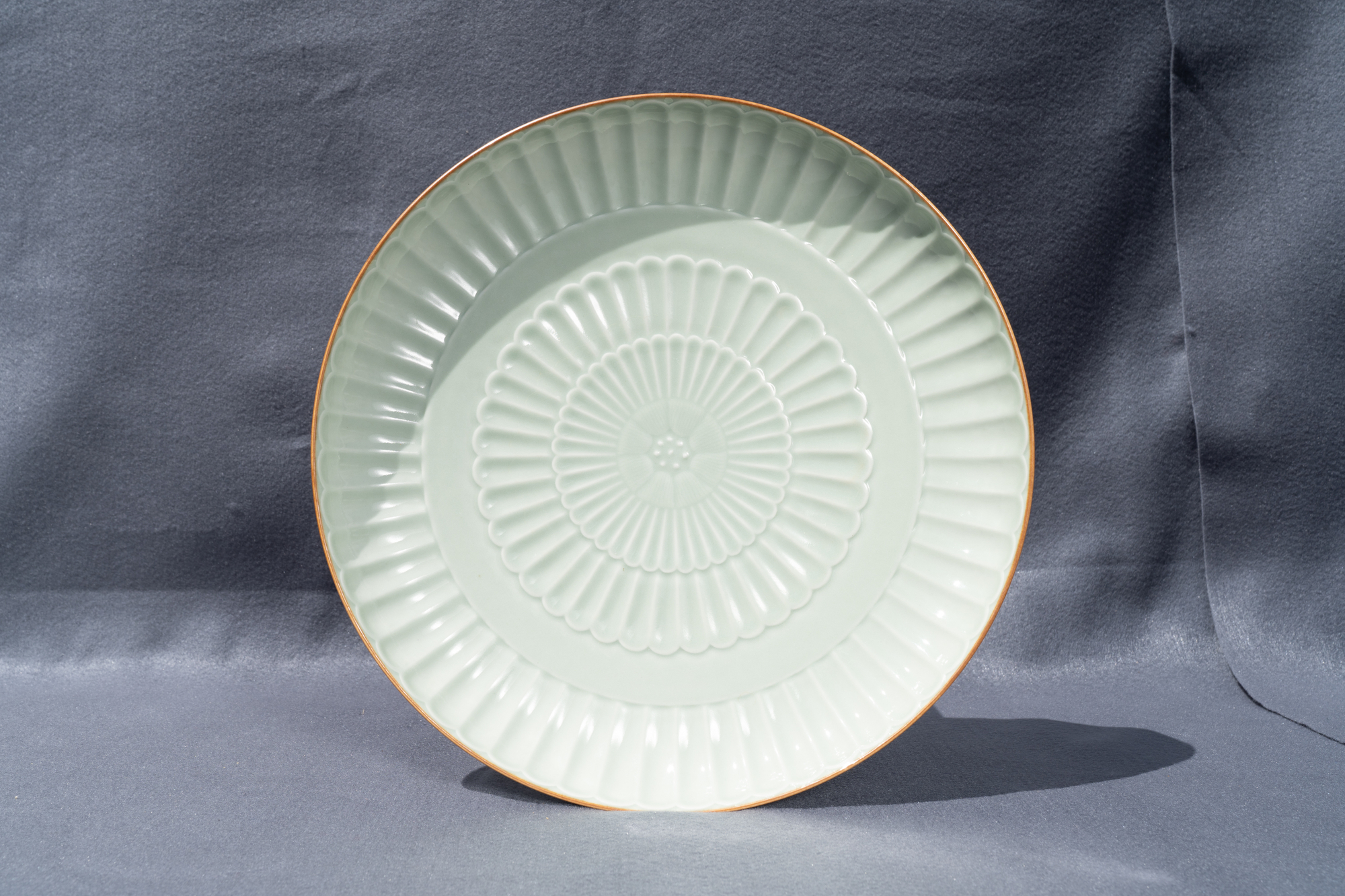 A Chinese celadon-glazed 'chrysanthemum' charger, Jingdezhen mark, dated 1954 - Image 3 of 7