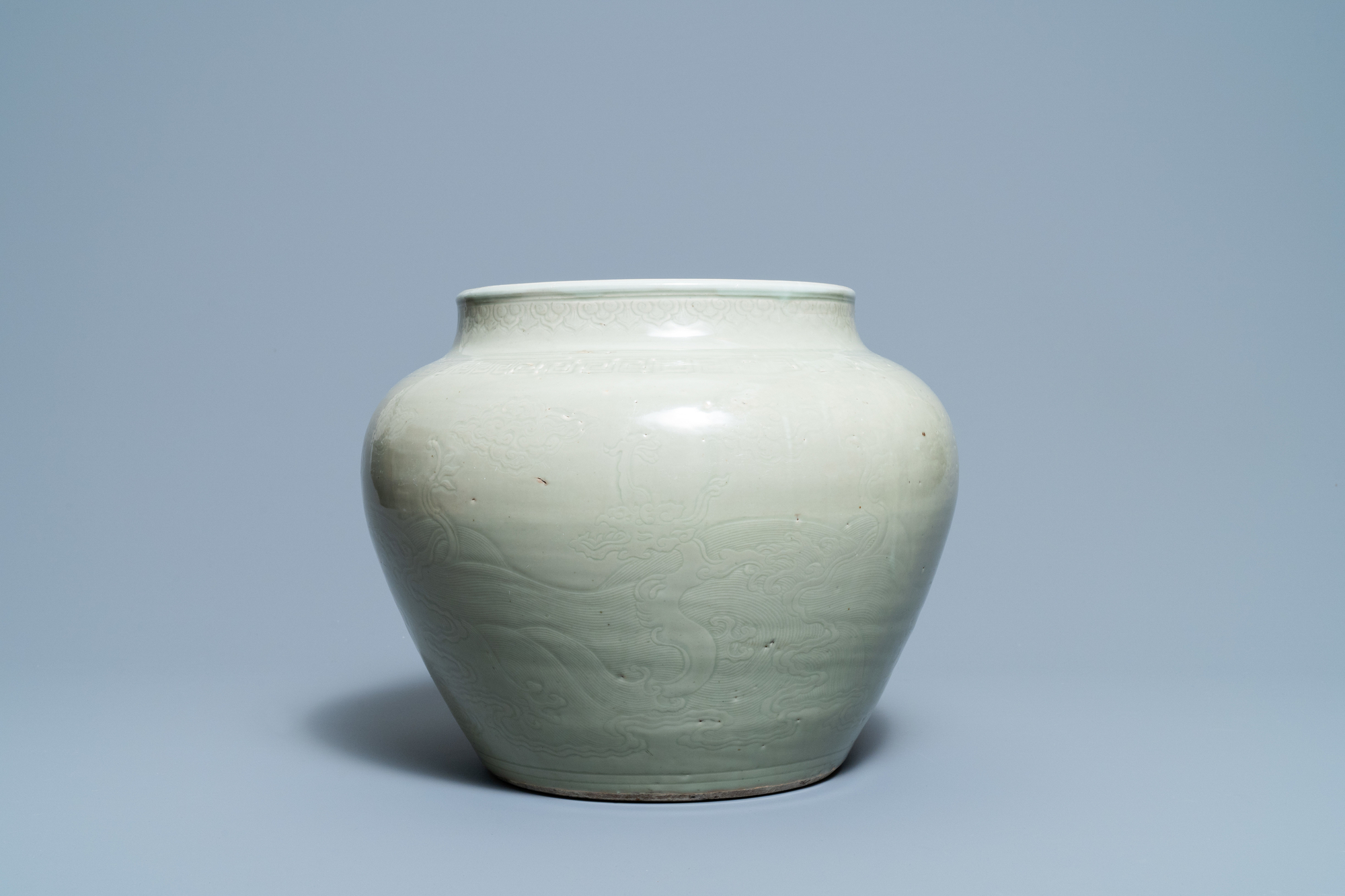 A globular Chinese monochrome celadon 'dragon' vase, Kangxi - Image 2 of 8