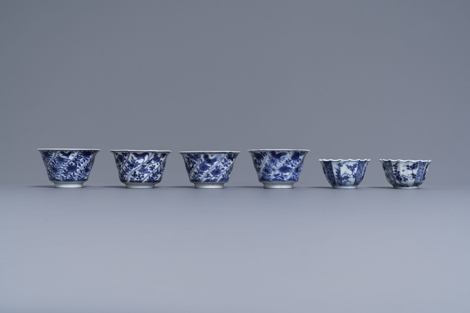 Six Chinese blue and white cups and saucers and eleven miniature vases, Kangxi - Image 15 of 17