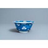 A Chinese blue and white 'prunus on cracked ice' bowl, Kangxi