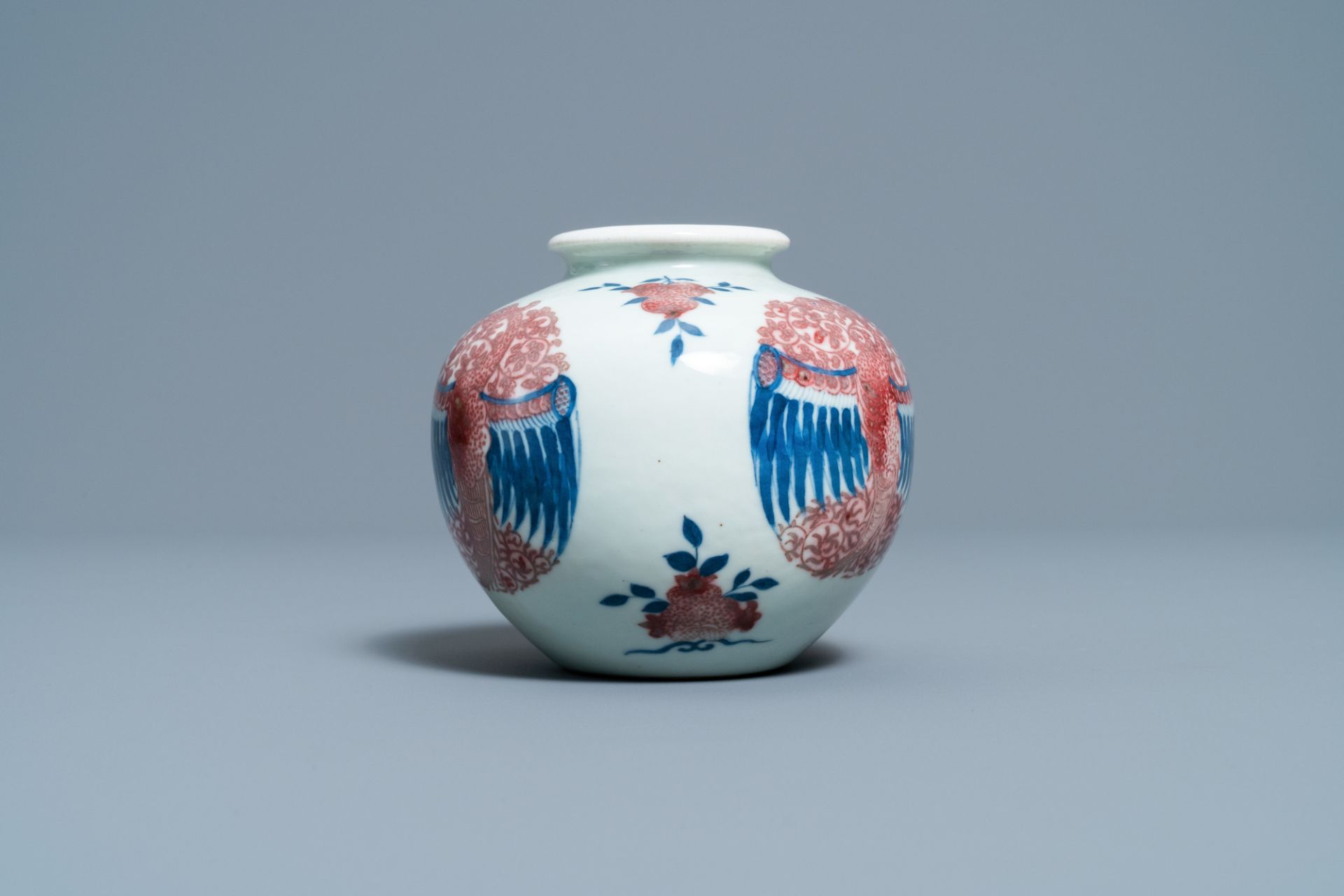 A Chinese blue, white and copper-red 'phoenixes' water pot, Kangxi mark, 19th C. - Image 3 of 7