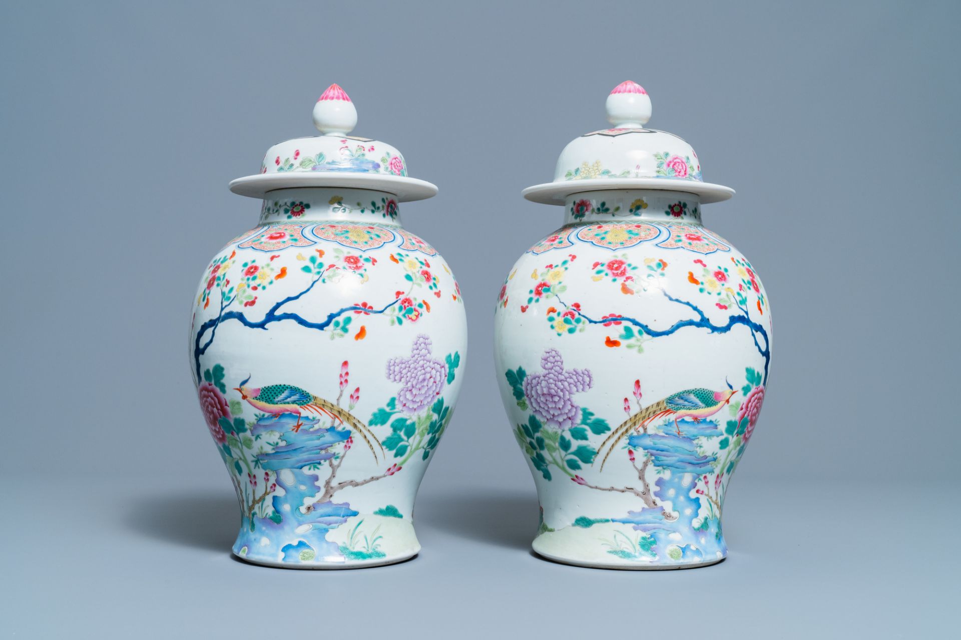 A pair of Chinese famille rose 'pheasants' vases and covers, 19th C. - Image 2 of 6