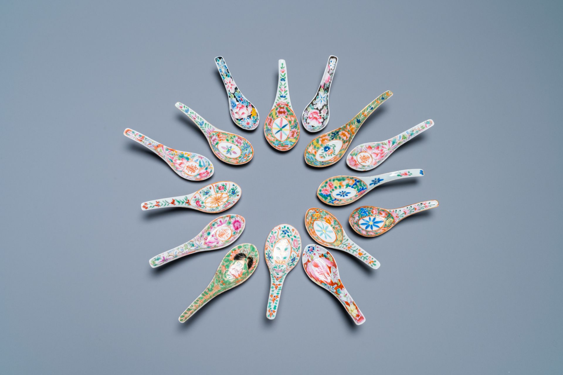 Fifteen Chinese Canton famille rose and millefleurs spoons, 19/20th C.