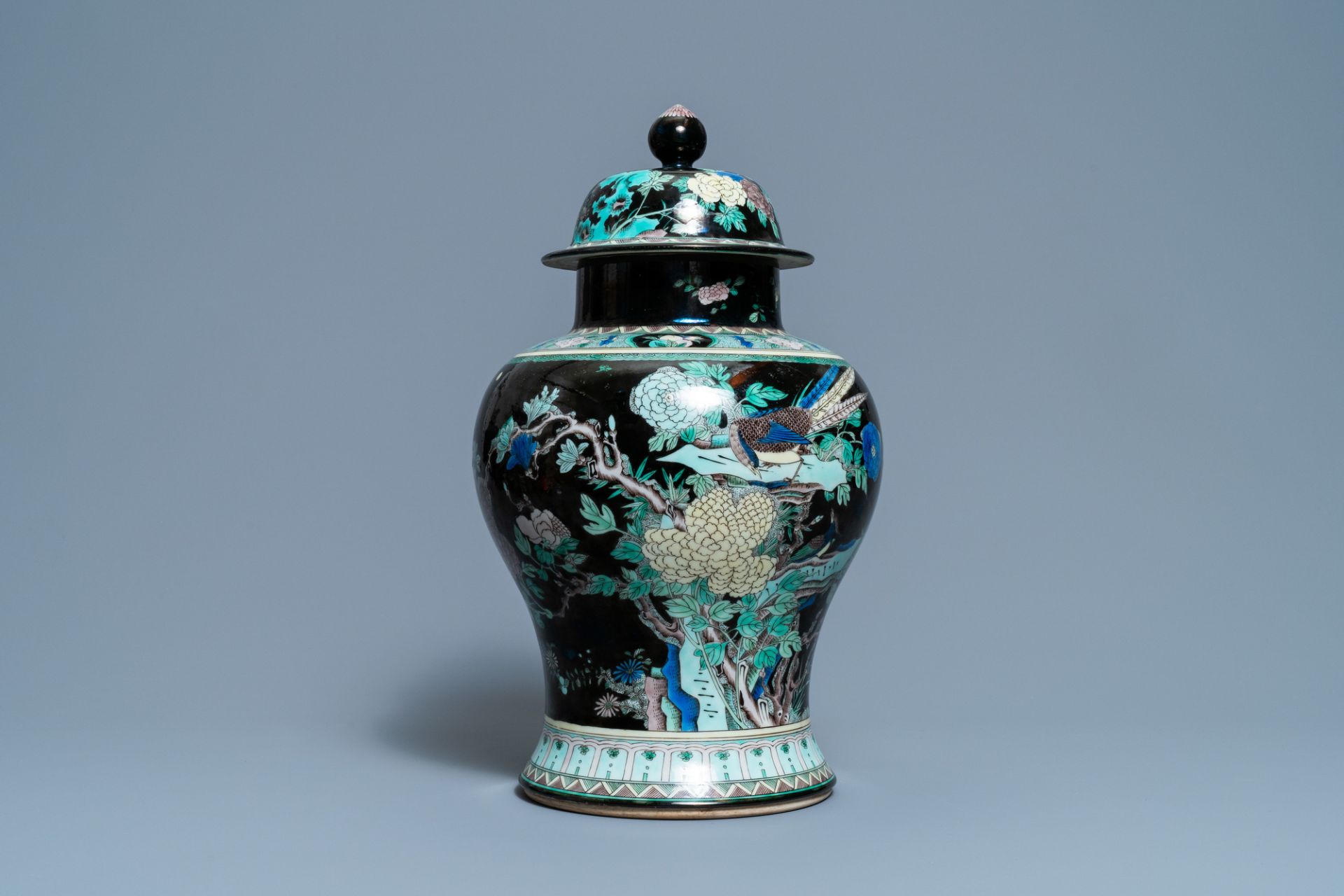 A Chinese famille noire vase and cover, 19th C.