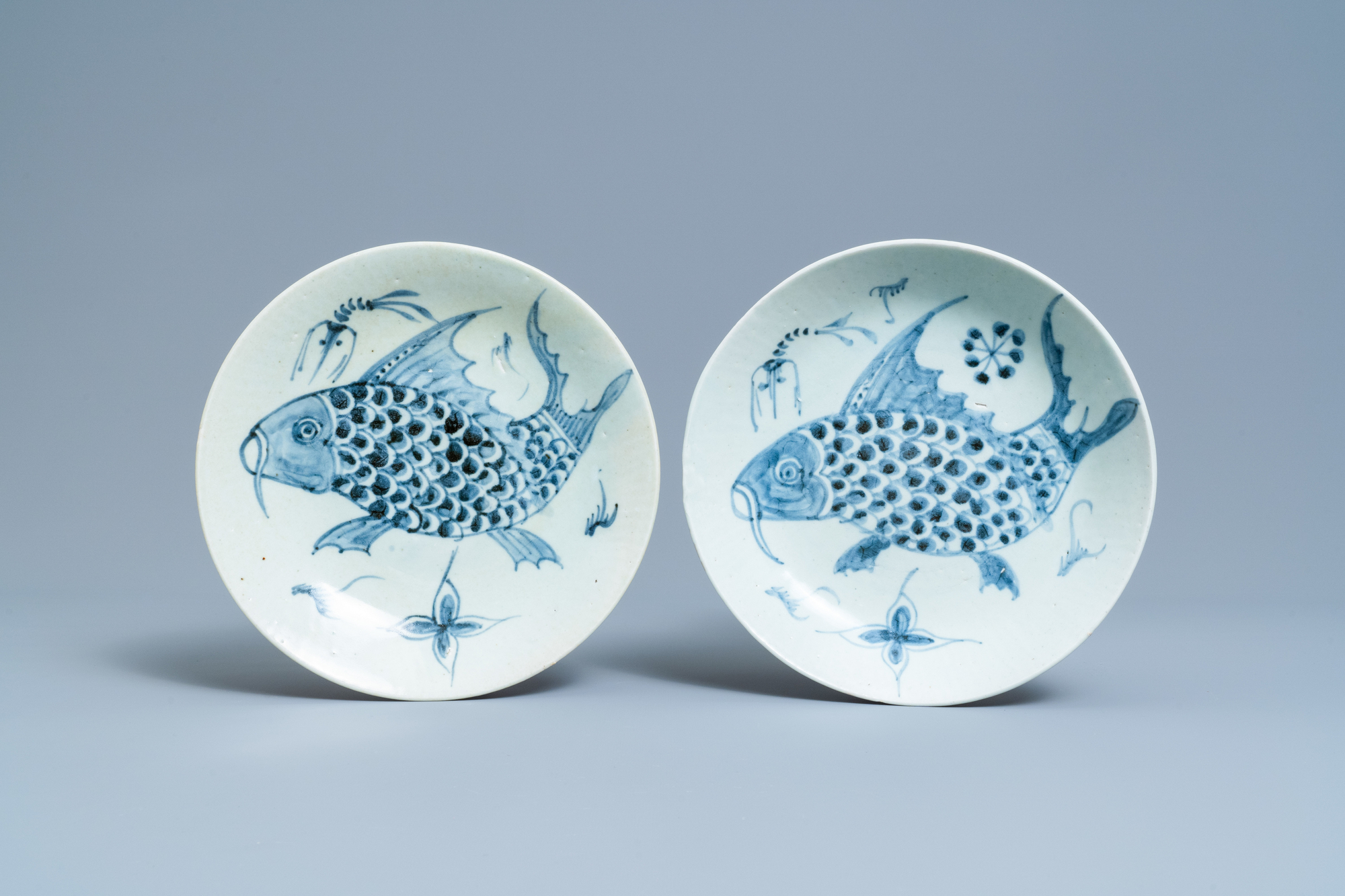 Four Chinese blue and white 'carps and shrimps' dishes, Dehua, 18/19th C. - Image 4 of 5