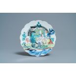 A Dutch-decorated Chinese blue and white plate with a romantic scene, Qianlong