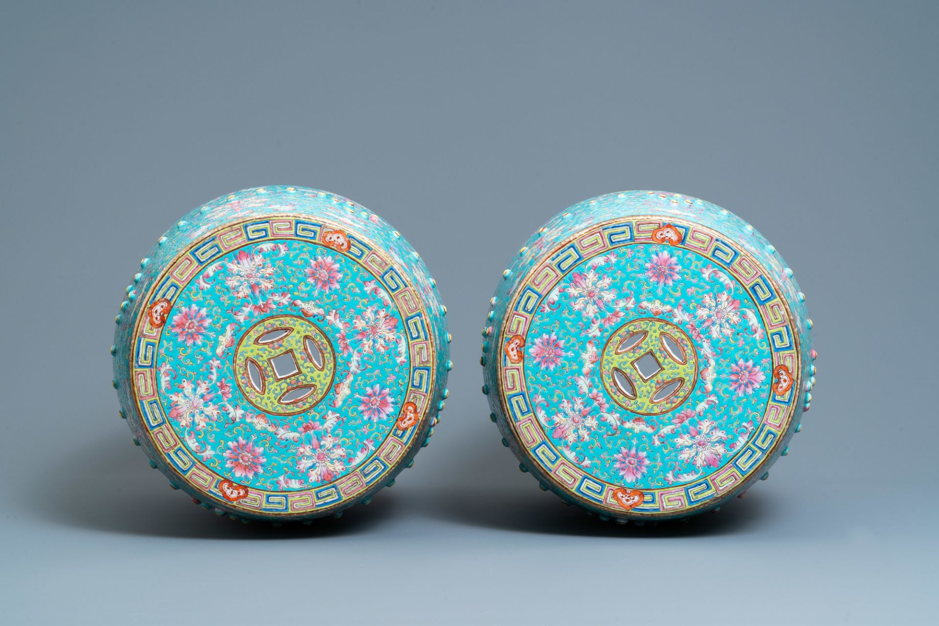 A pair of Chinese turquoise-ground famille rose garden seats, 19th C. - Image 6 of 7