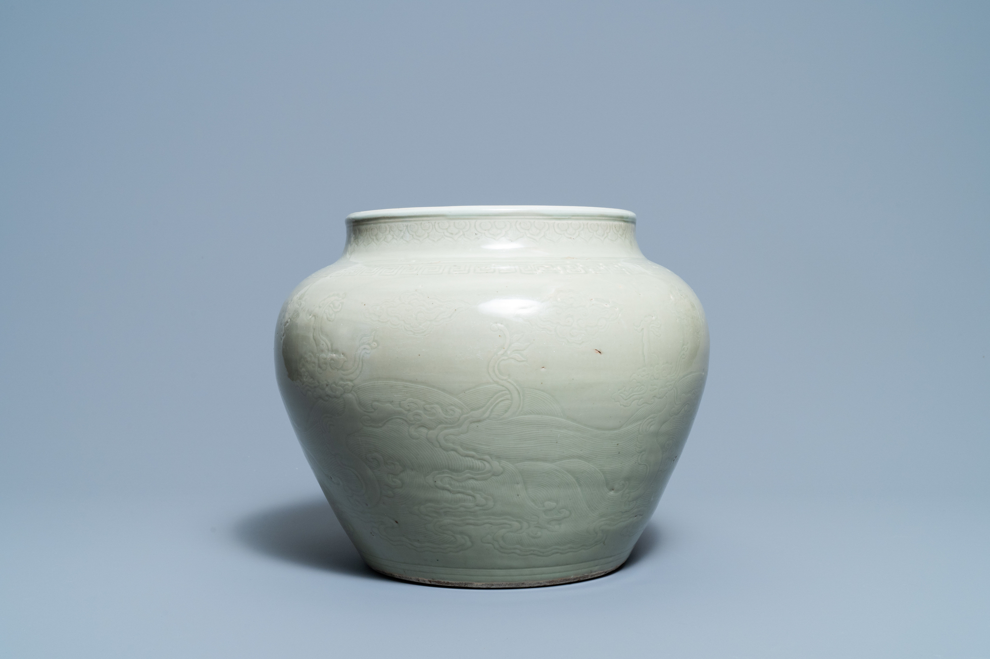A globular Chinese monochrome celadon 'dragon' vase, Kangxi - Image 3 of 8