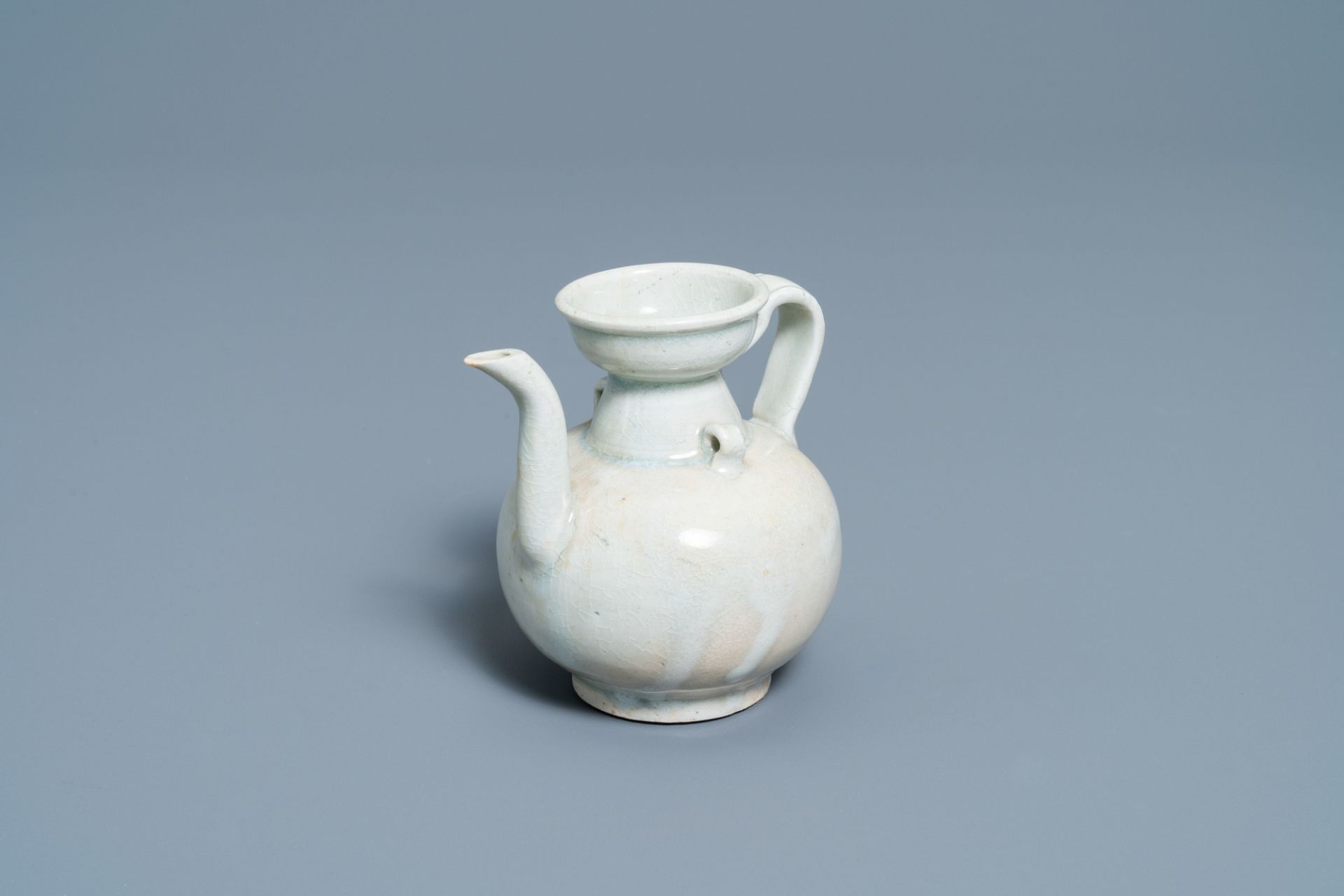 A Chinese celadon-glazed 'Yue' ewer, Song