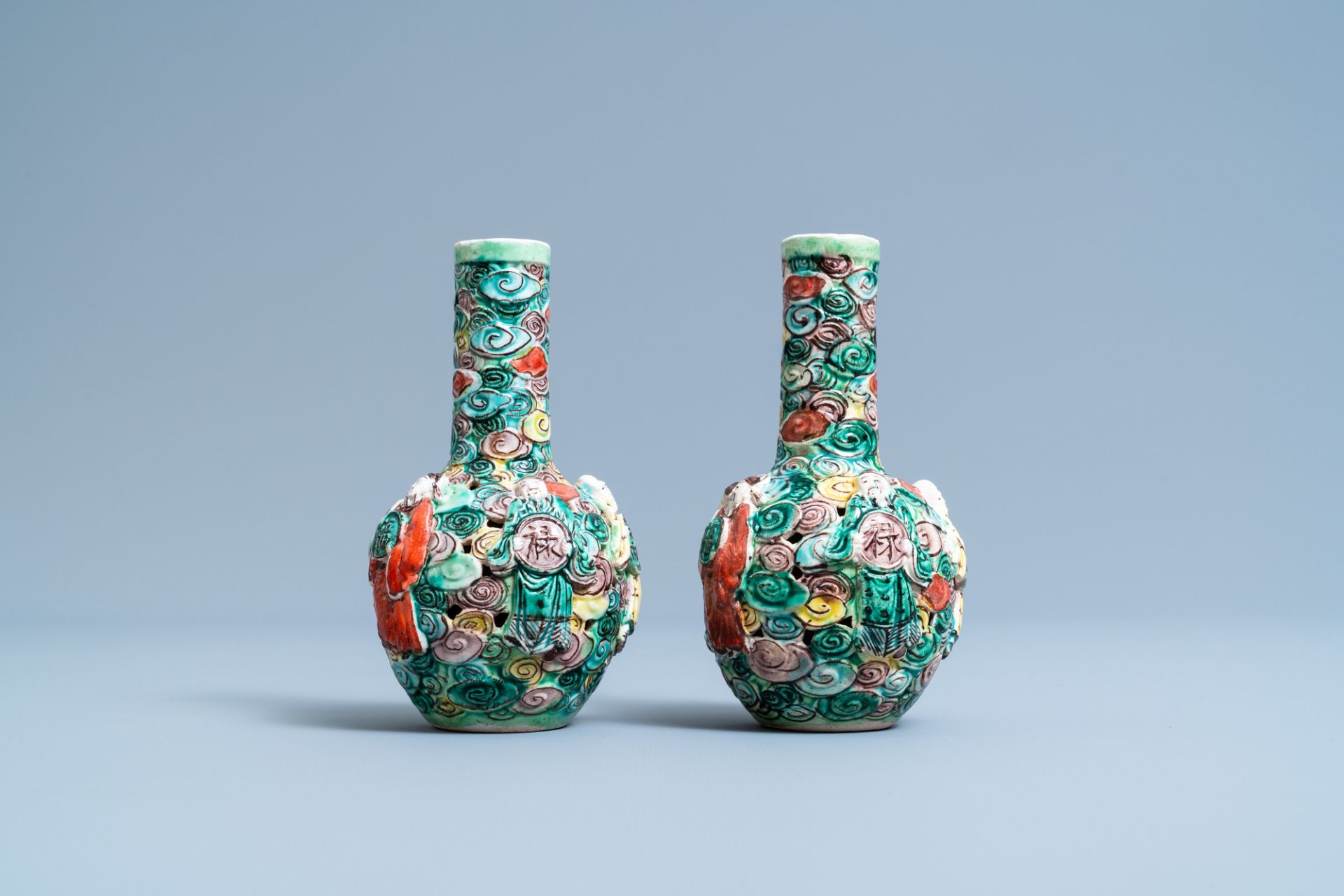 A pair of Chinese reticulated famille verte bottle vases, 19th C. - Image 2 of 6