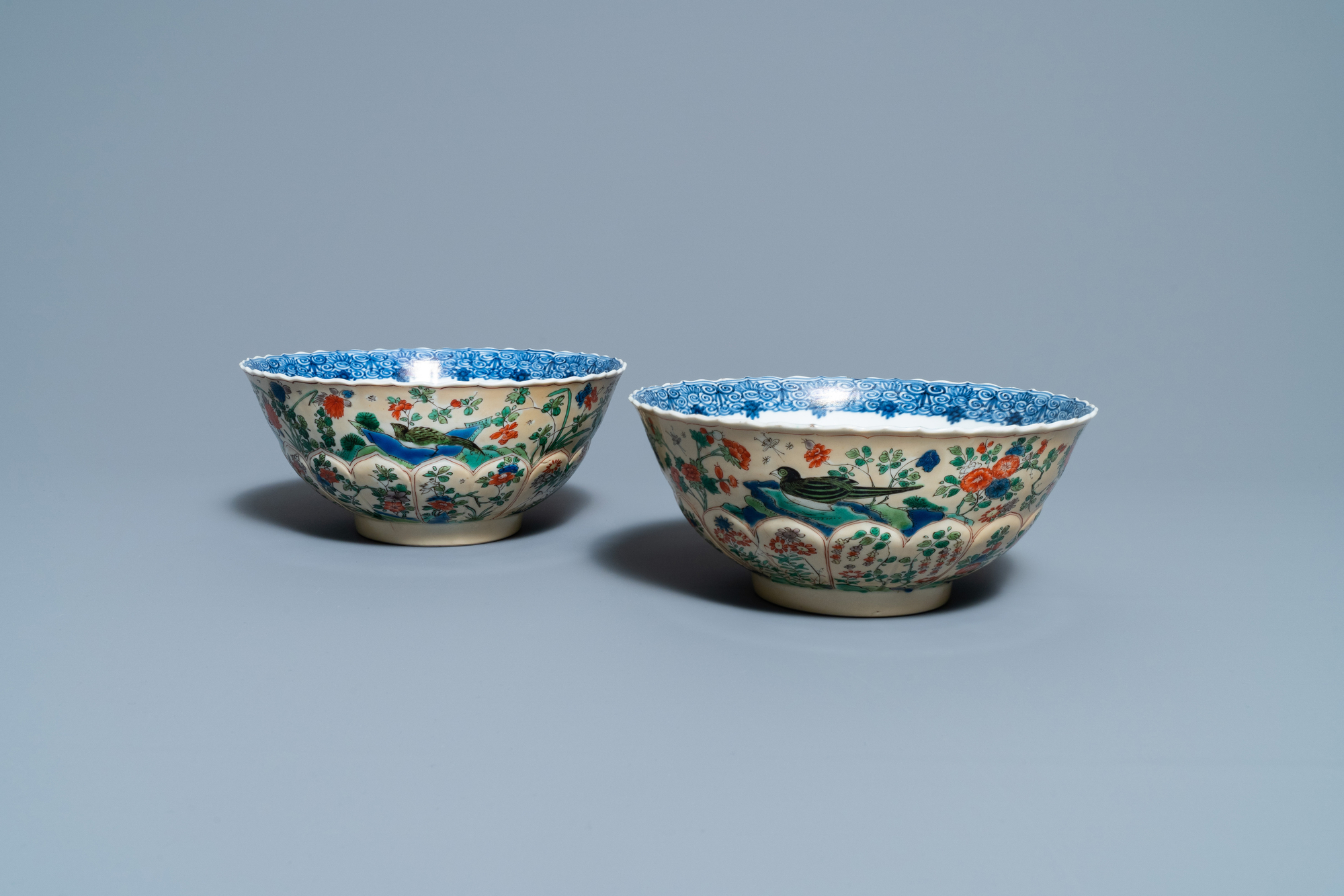 A pair of Chinese famille verte cafe-au-lait-ground lotus-molded bowls, Kangxi