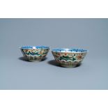 A pair of Chinese famille verte cafe-au-lait-ground lotus-molded bowls, Kangxi