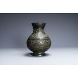 A Chinese archaic bronze inscribed 'hu' vase, 17/18th C.