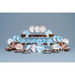 31 Chinese capucine brown-ground saucers and 22 cups, Kangxi/Qianlong