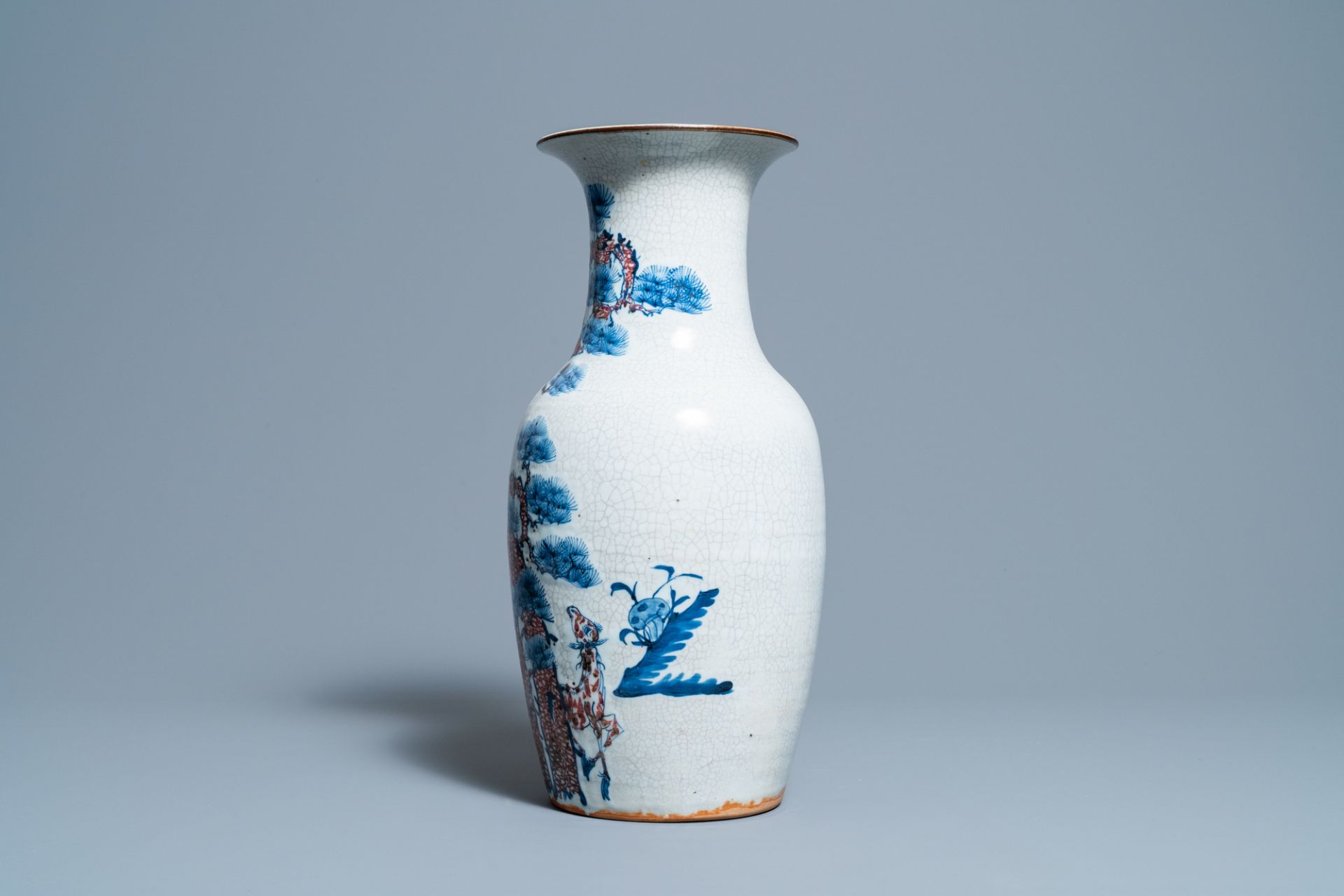 A Chinese blue, white and copper-red 'deer and crane' vase, 19th C. - Image 2 of 6