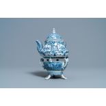 An extremely rare Arita blue and white Delft-style kettle on heating stand, Japan, Edo, ca. 1750