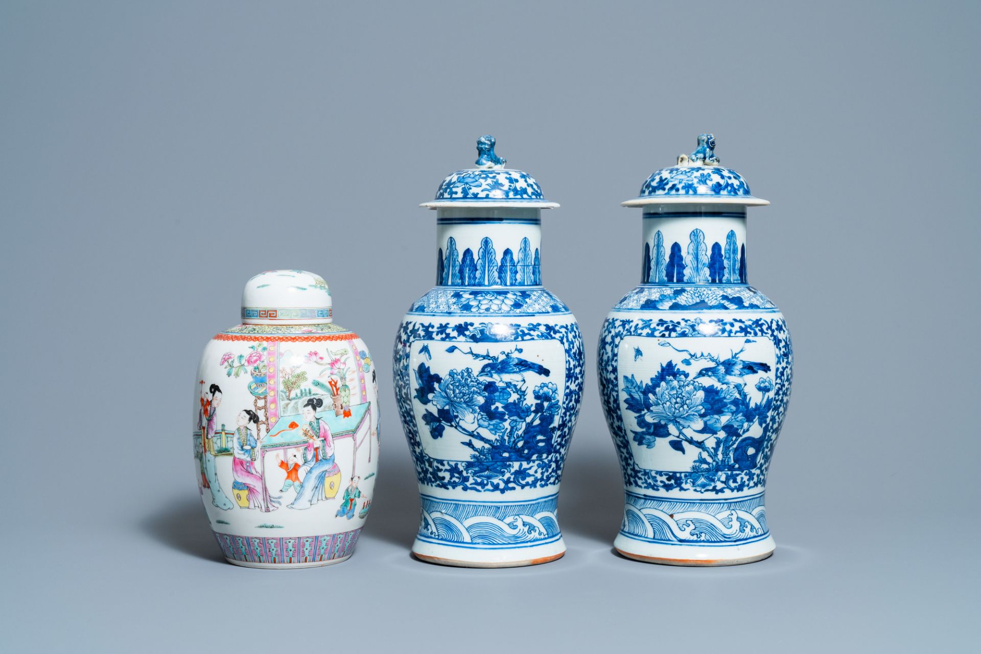 A pair of Chinese blue and white vases and a famille rose jar and cover, 19/20th C. - Image 2 of 9