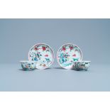 A pair of Chinese famille rose 'mountainous landscape' cups and saucers, Yongzheng