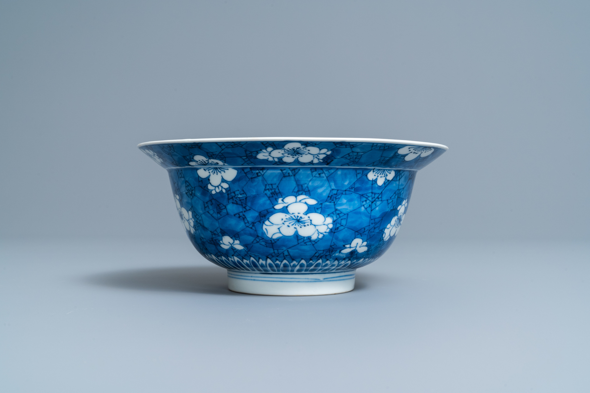 A Chinese blue and white 'prunus on cracked ice' bowl, Kangxi - Image 2 of 7