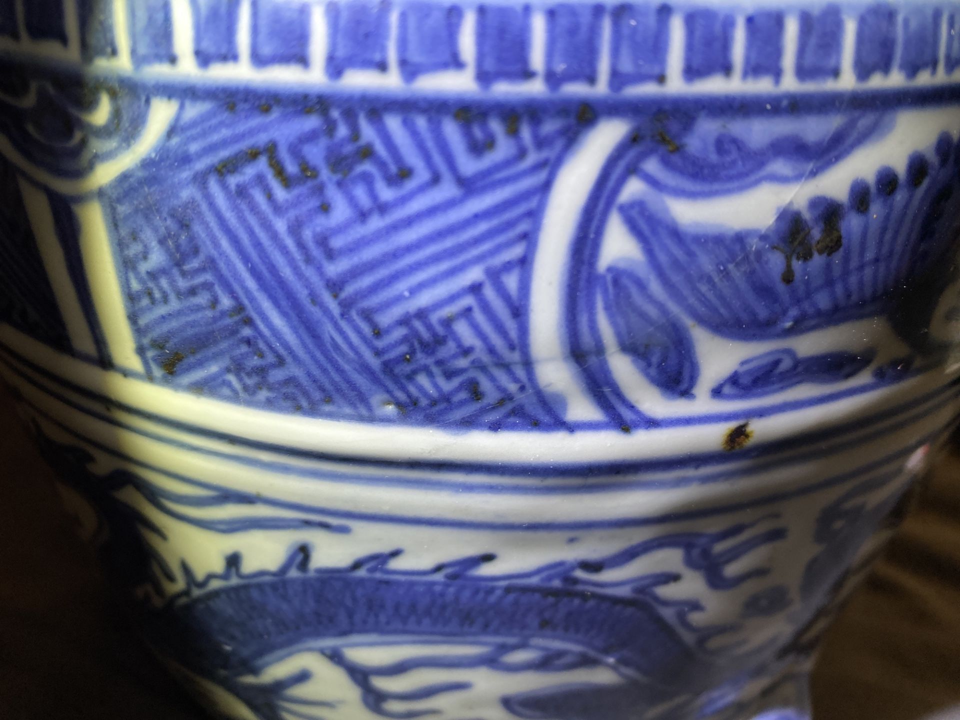 A Chinese blue and white 'dragon' tripod censer, Ming - Image 9 of 20