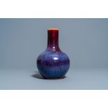 A Chinese flambe-glazed bottle vase, 19th C.