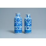 Two Chinese blue and white rouleau vases with horizontal dragon panels, Kangxi