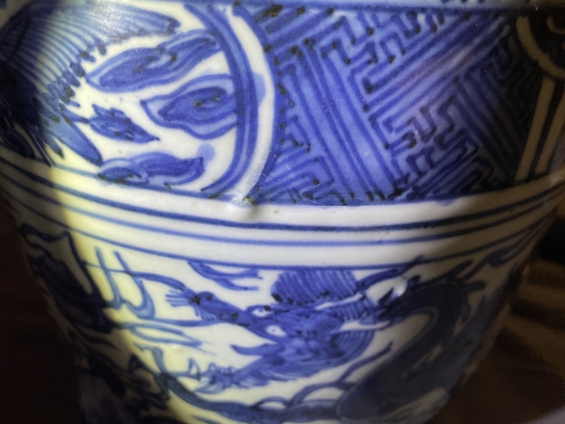 A Chinese blue and white 'dragon' tripod censer, Ming - Image 13 of 20