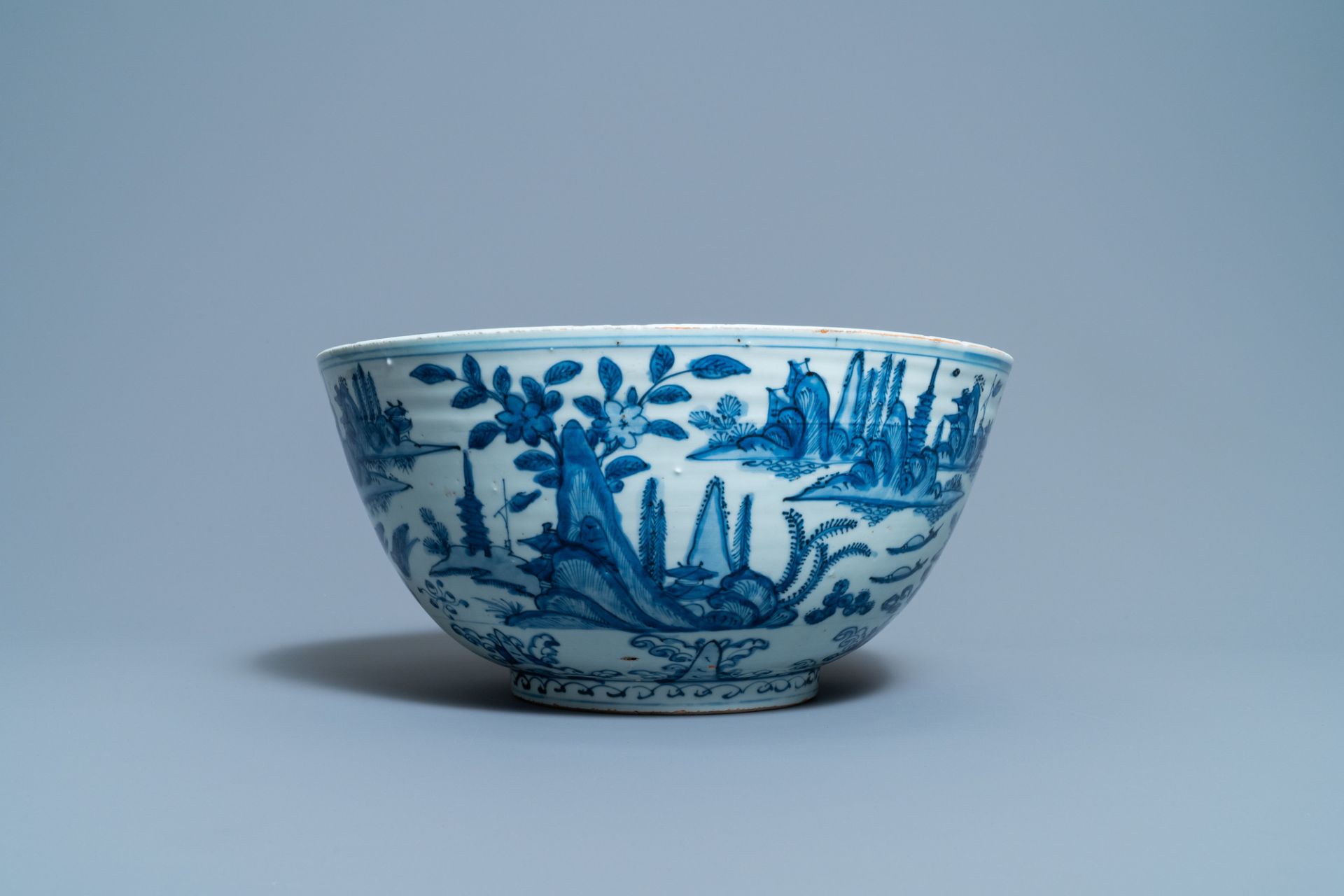 A large Chinese blue and white 'river landscape' bowl, Ming - Image 3 of 13