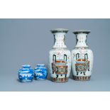 A pair of Chinese blue and white covered jars and a pair of famille rose vases, 19th C.