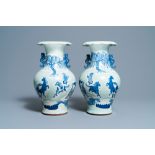 A pair of Chinese blue and white celadon 'horse' vases, 19th C.