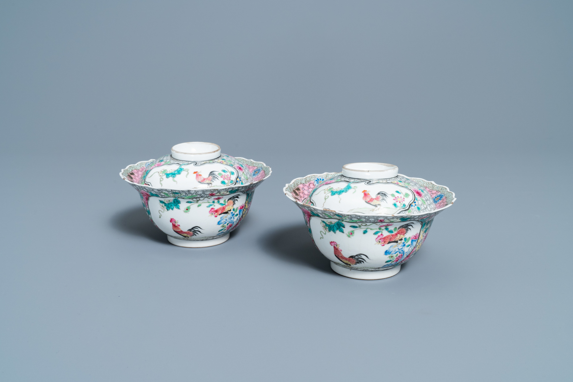 A pair of Chinese famille rose 'rooster' bowls and covers, Yongzheng