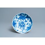 A Chinese blue and white 'dragon and qilin' dish, Yongzheng mark and of the period