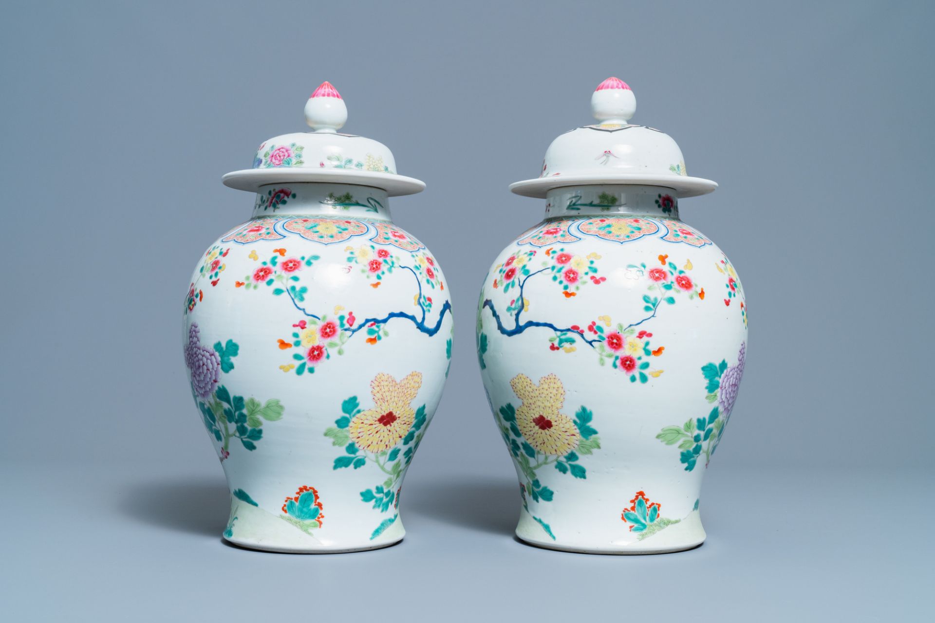 A pair of Chinese famille rose 'pheasants' vases and covers, 19th C. - Image 3 of 6
