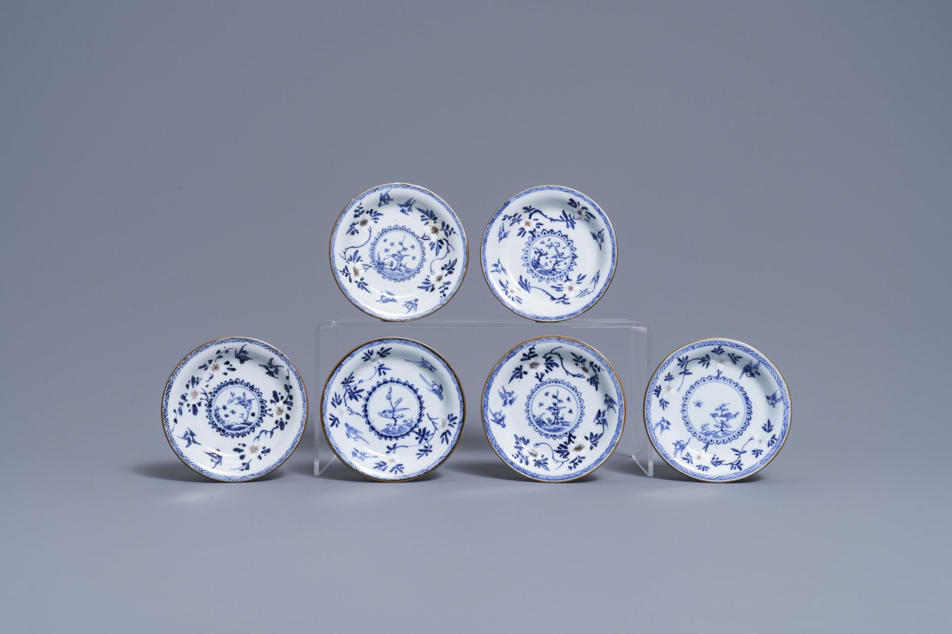 Six Chinese blue, white and copper-red cups and saucers, Kangxi - Image 2 of 9