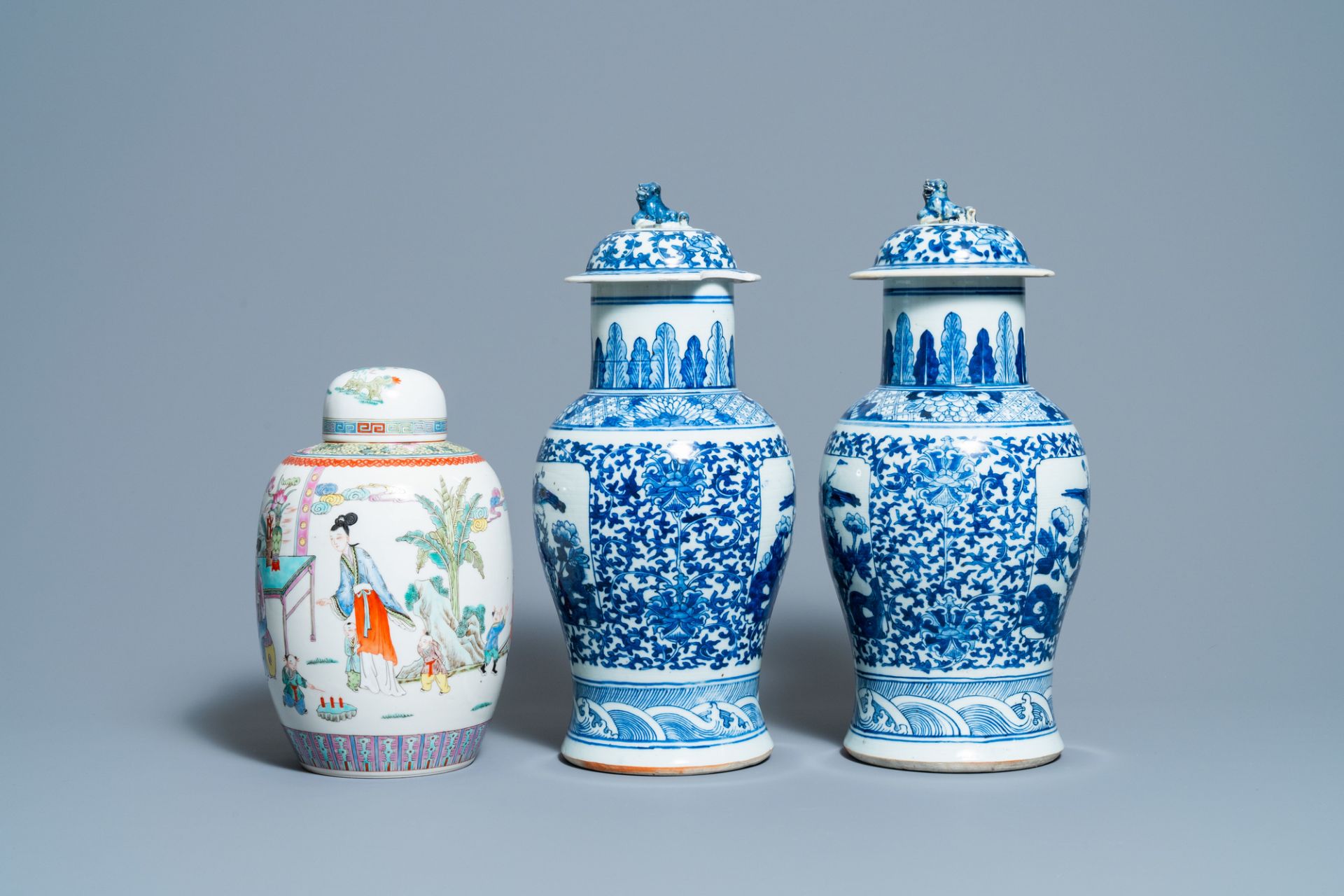 A pair of Chinese blue and white vases and a famille rose jar and cover, 19/20th C. - Image 3 of 9