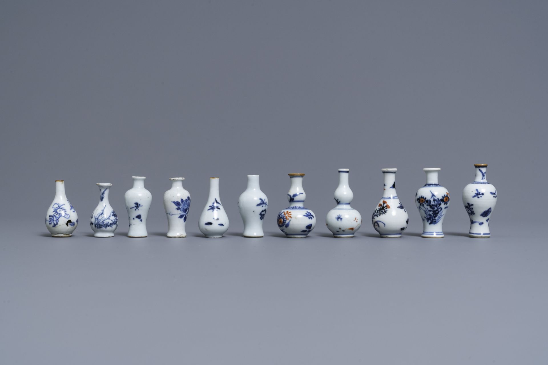 Six Chinese blue and white cups and saucers and eleven miniature vases, Kangxi - Image 4 of 17