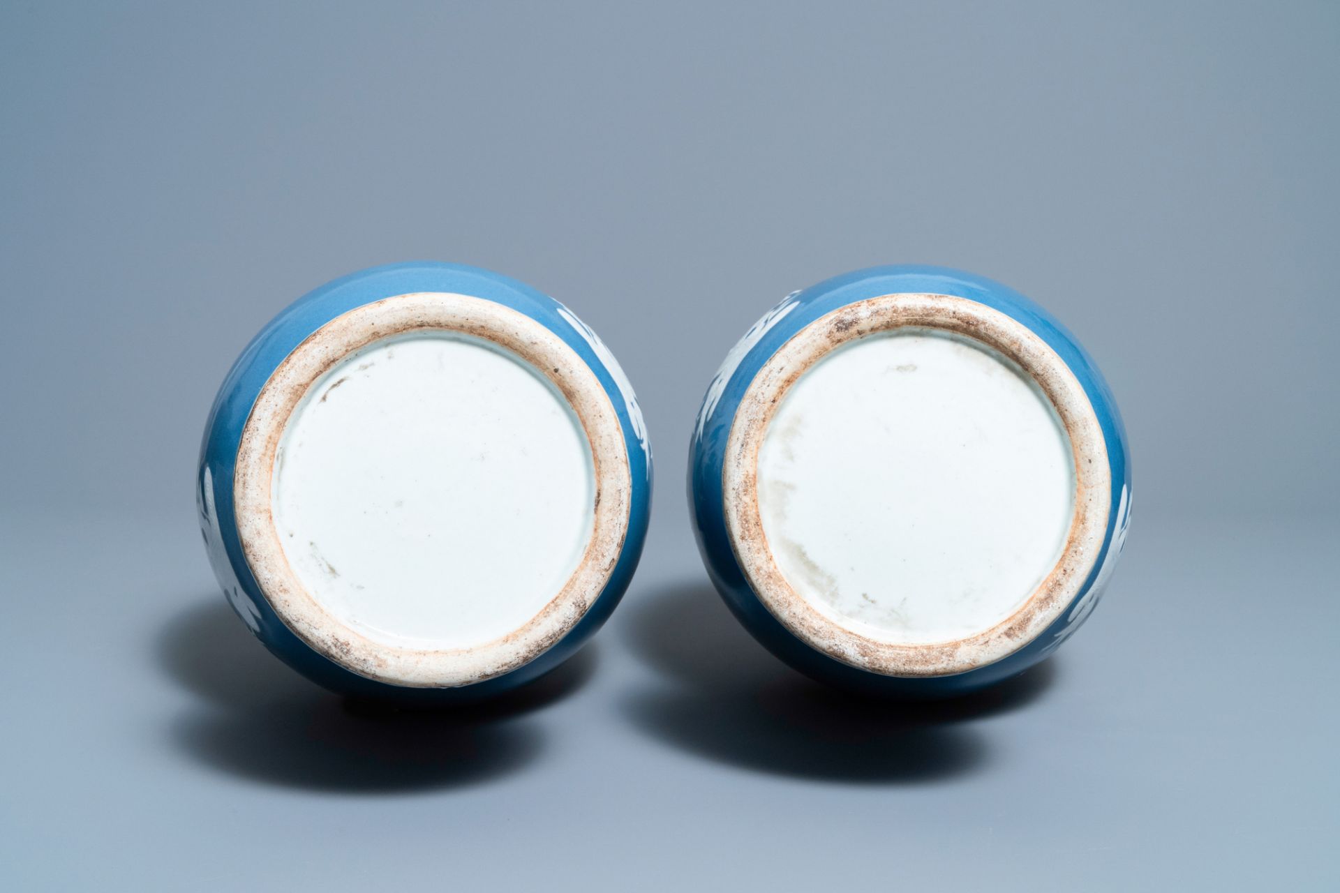 A pair of Chinese white slip-decorated blue-ground vases, 19th C. - Image 6 of 6