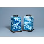 A pair of Chinese blue and white square 'landscape' jars, 19th C.