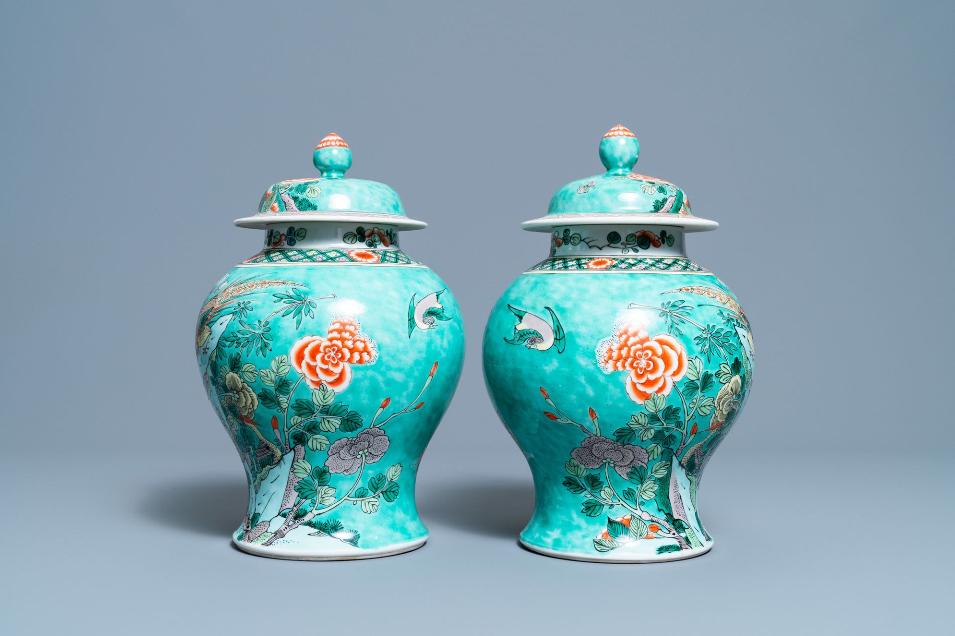 A pair of Chinese turquoise-ground famille verte vases and covers, 19th C. - Image 3 of 7