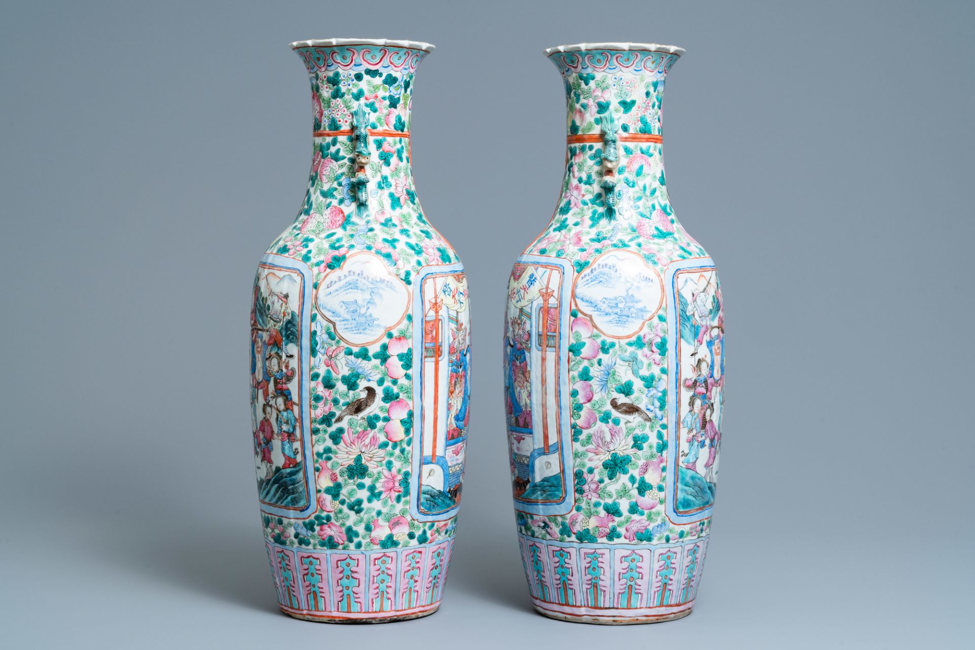 A pair of Chinese famille rose vases with court and warrior scenes, 19th C. - Image 4 of 12