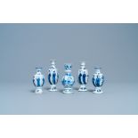 Four Chinese blue and white miniature vases and a huqqa base, Kangxi